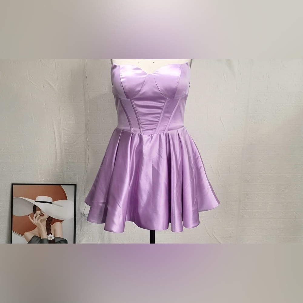 Custom made lilac strapless a-line mini dress 
Gorgeous. Worn once